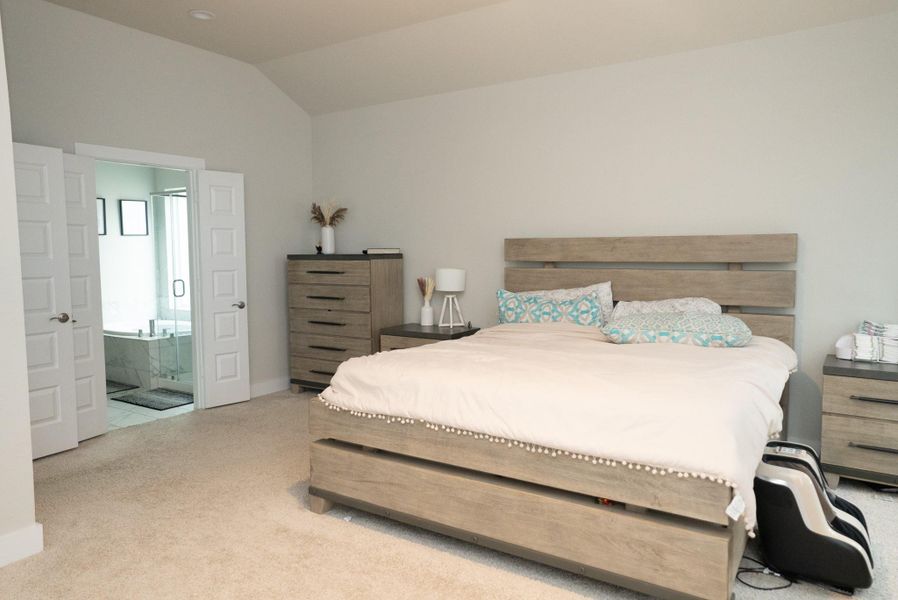 Furnished interior view inside a new home in Sunterra, Katy (Image 38).