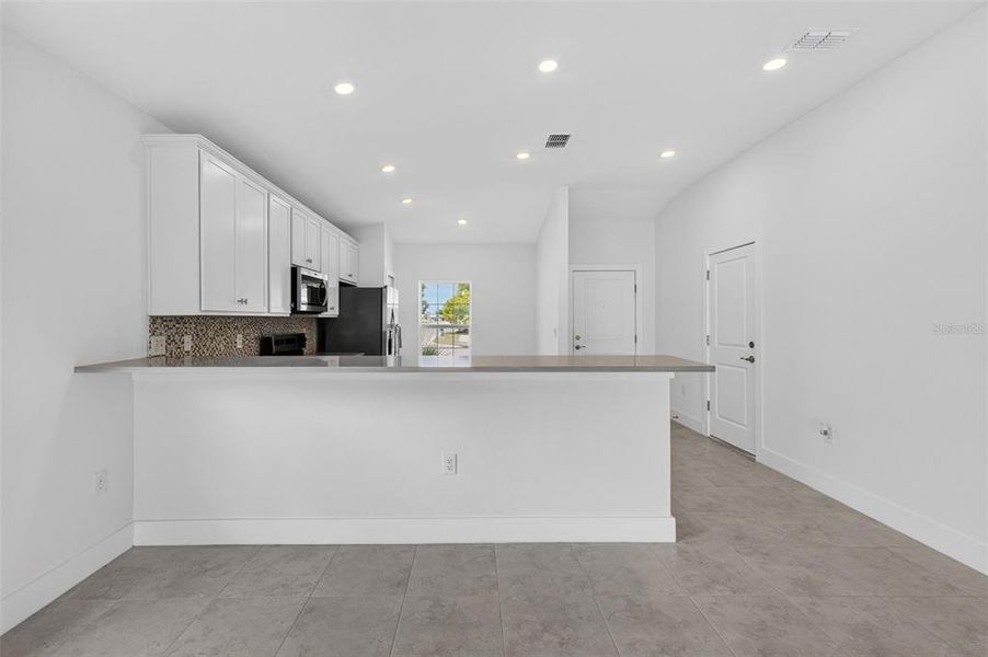Furnished interior view inside a new home in , Port Charlotte (Image 10).