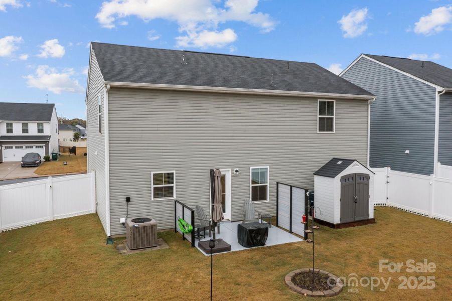 Exterior details and patio area of a home in , Troutman (Image 26).
