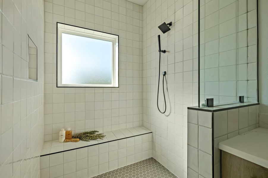 Bathroom with walk in shower and tile walls Bathroom with walk in shower and tile walls