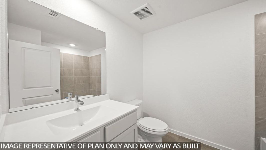 Furnished interior view inside a new home in Granger Pines, Conroe (Image 5).