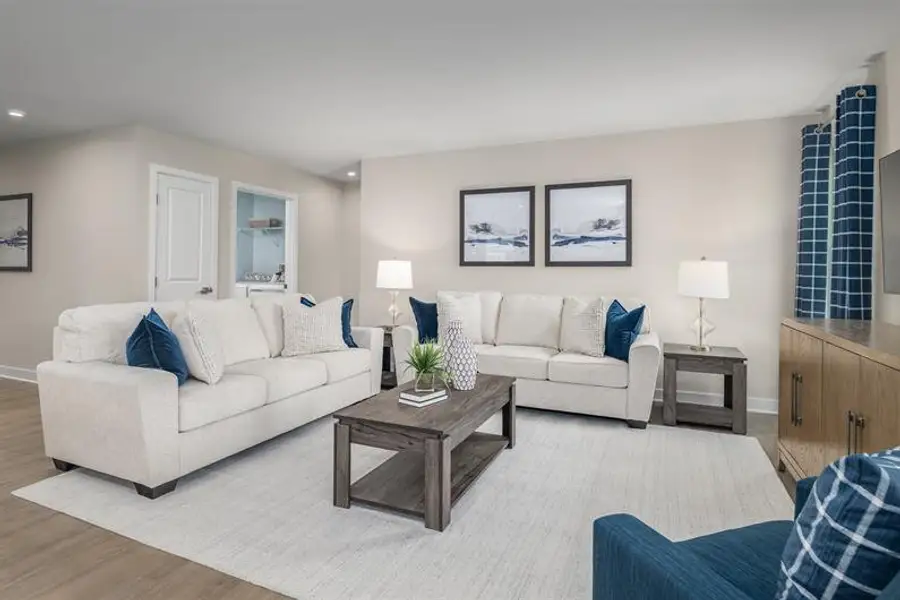 Furnished interior view inside a new home in Reidville Town Center Cottages, Duncan (Image 11).
