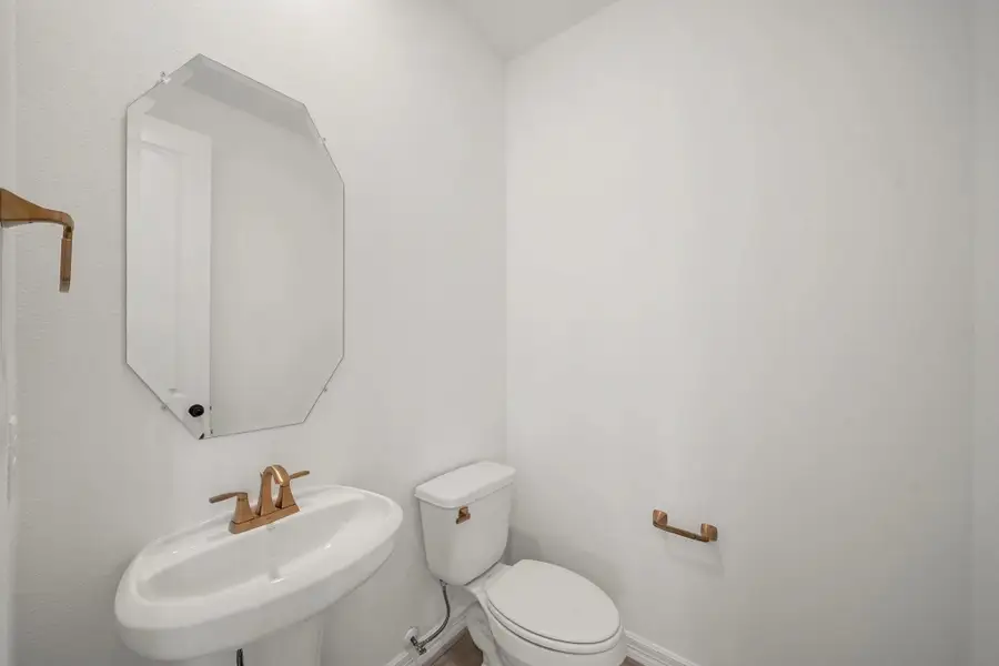 Powder bathroom. Sample product photo. Actual exterior and interior selections may vary by homesite. Photo may be virtually staged. Powder bathroom. Sample product photo. Actual exterior and interior selections may vary by homesite. Photo may be virtually staged.