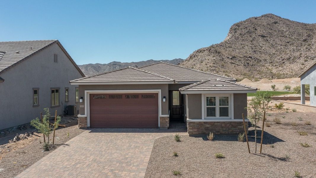 Representative exterior photo of a completed home built from the Sawgrass II by William Ryan Homes in Fairways in Victory at Verrado, Buckeye, AZ (Image 17).
