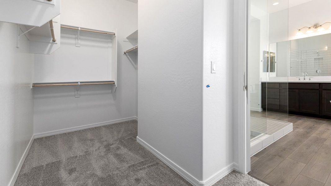Representative furnished interior of a home built from the Granada by DRB Homes in Windrose, Waddell (Image 28).