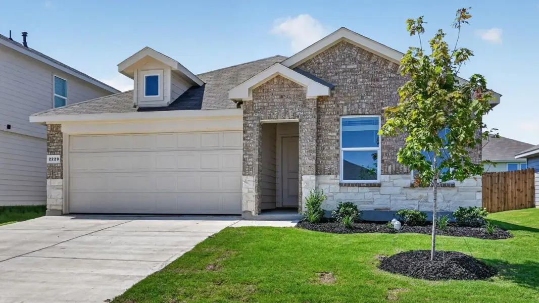 Representative exterior photo of a completed home built from the Anderson by D.R. Horton in Somerset, Hillsboro, TX (Image 19).