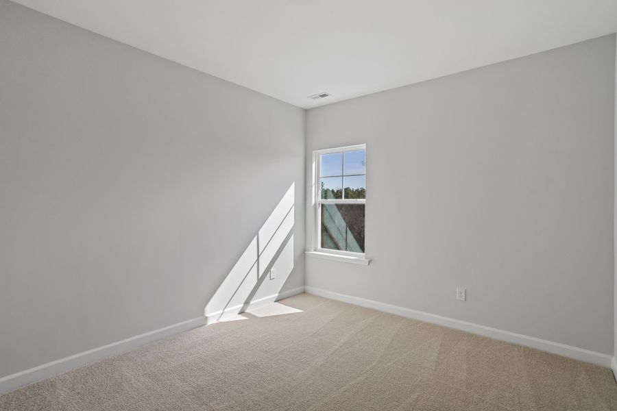 Spacious, unfurnished interior of a new home in Sweetbrier, Durham (Image 37).