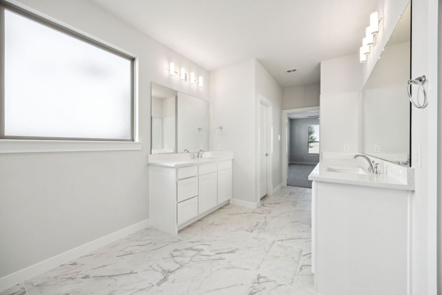 Primary Bathroom in the Wimbledon home plan by Trophy Signature Homes – REPRESENTATIVE PHOTO
