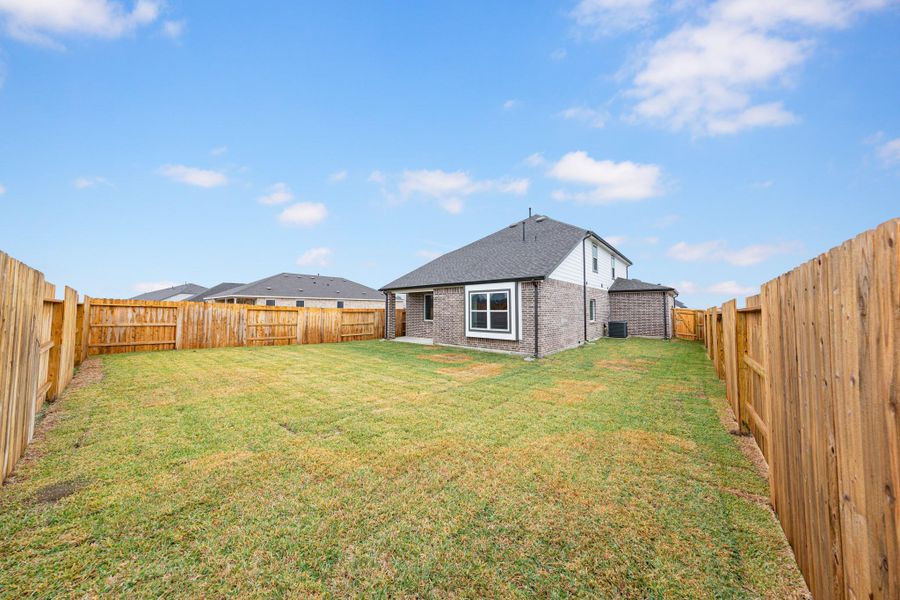 Exterior details and patio area of a home in River Ranch, Dayton (Image 3). Exterior details and patio area of a home in River Ranch, Dayton (Image 3).