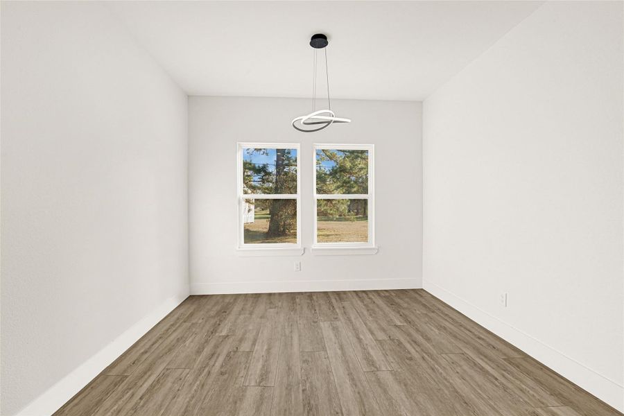 Dining room with modern chandelier