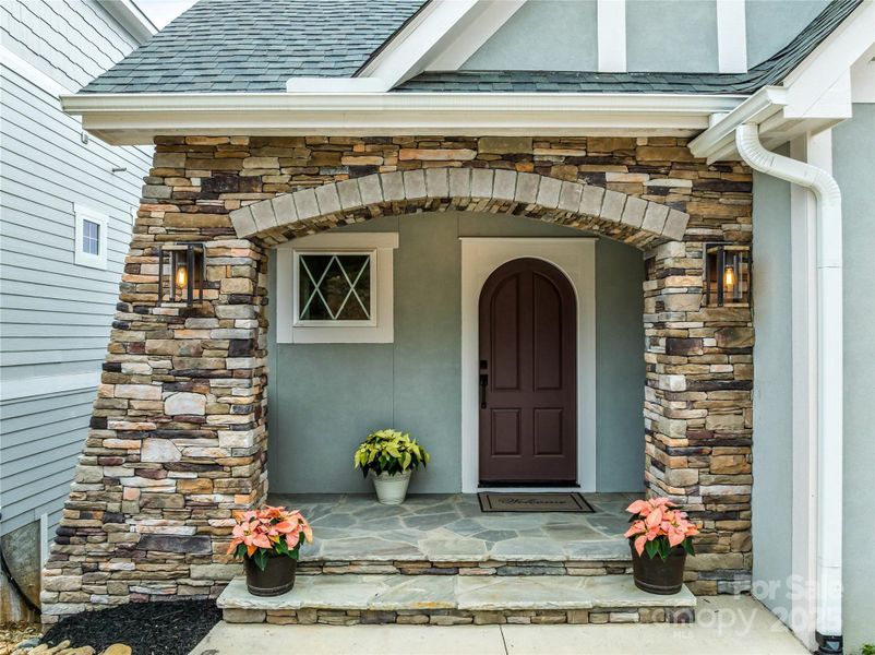 Exterior details and patio area of a home in , Black Mountain (Image 22). Exterior details and patio area of a home in , Black Mountain (Image 22).