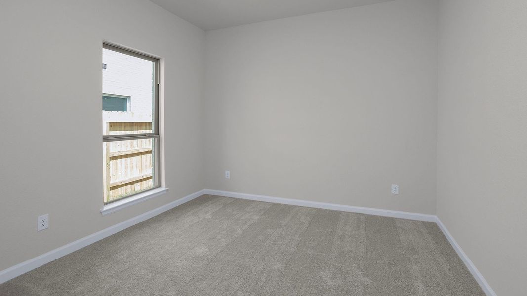 Spacious, unfurnished interior of a new home in The Groves 45', Humble (Image 13).