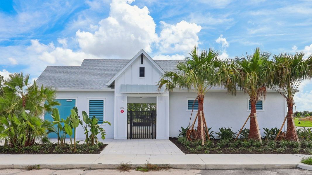 Front exterior of a new home in Cyrene at Harmony, St. Cloud, FL, highlighting curb appeal (Image 21).