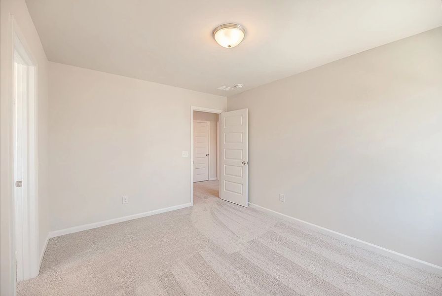 Representative unfurnished interior of a home built from the Monroe by Ashton Woods in Watson Hill, Summerville (Image 28). Representative unfurnished interior of a home built from the Monroe by Ashton Woods in Watson Hill, Summerville (Image 28).