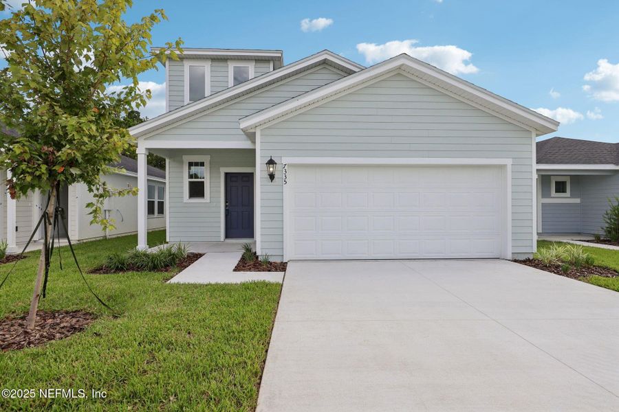 Front exterior of a new home in Kings Crossing, Jacksonville, FL, highlighting curb appeal (Image 21). Front exterior of a new home in Kings Crossing, Jacksonville, FL, highlighting curb appeal (Image 21).