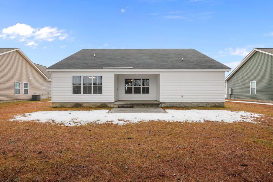 Exterior details and patio area of a home in Davenport Farms, Winterville (Image 25).