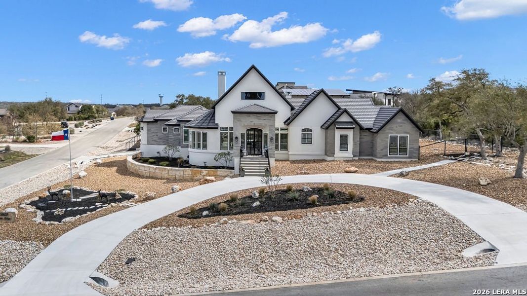 Front exterior of a new home in , New Braunfels, TX, highlighting curb appeal (Image 20).