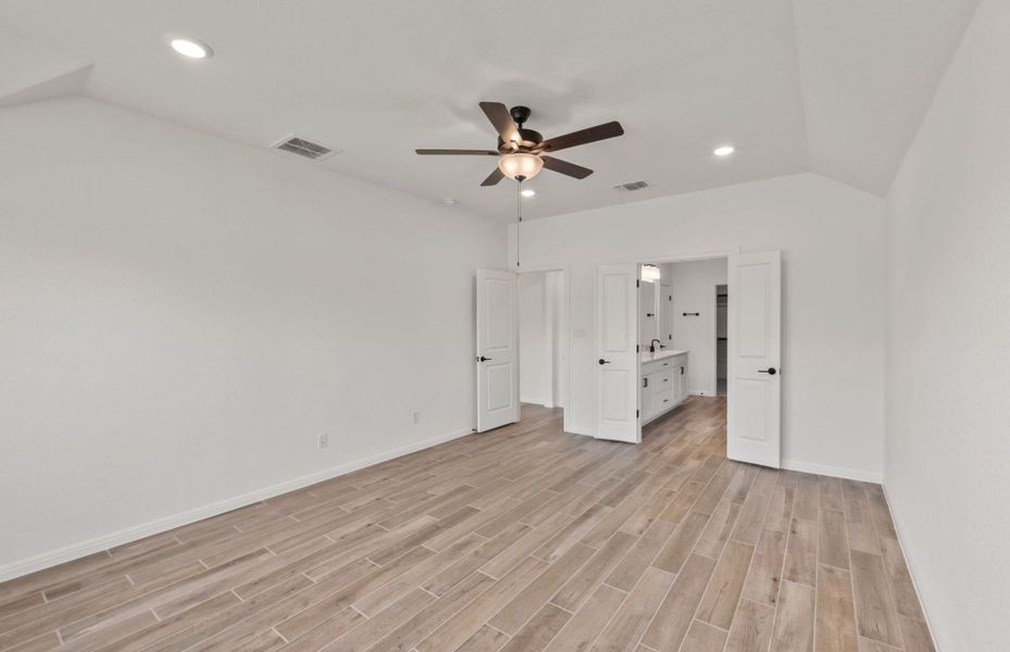 Representative unfurnished interior of a home built from the McKinney by Pulte Homes in Crescent Bluff, Georgetown (Image 14).