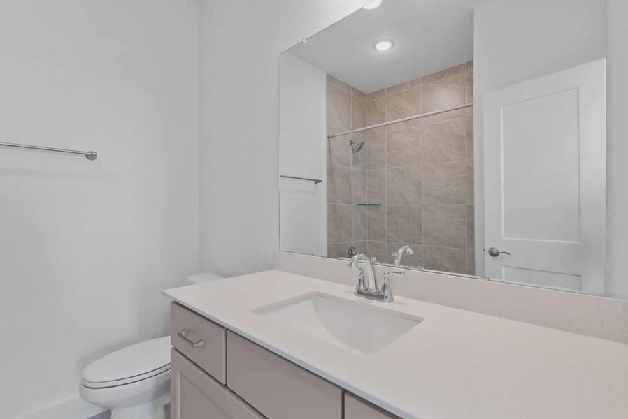 Representative furnished interior of a home built from the St Andrews by Chesmar Homes in Riceland Alley Loads, Mont Belvieu (Image 10).