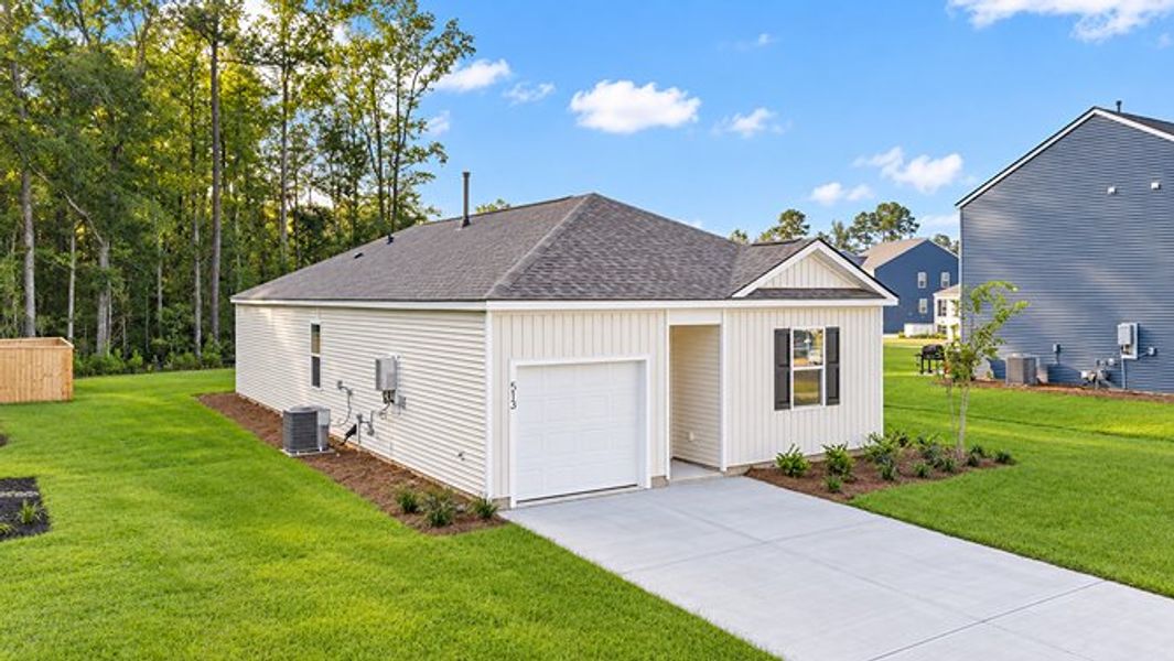 Front exterior of a new home in Pine Hills at Cane Bay, Summerville, SC, highlighting curb appeal (Image 2).