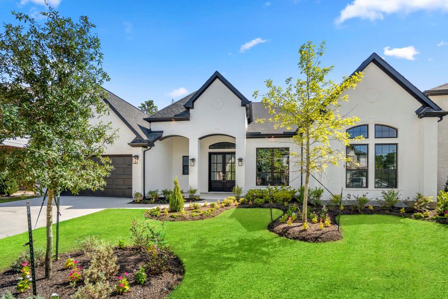 Front exterior of a new home in , Conroe, TX, highlighting curb appeal (Image 5).