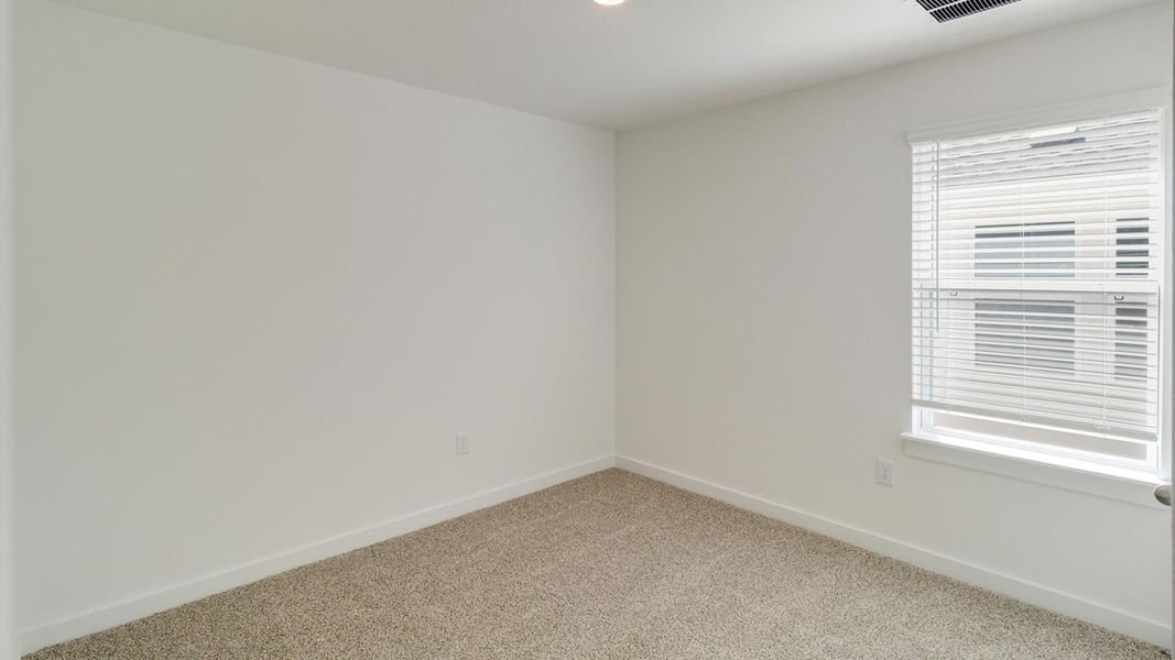 Spacious, unfurnished interior of a new home in Trails at Wildhorse, Austin (Image 11).