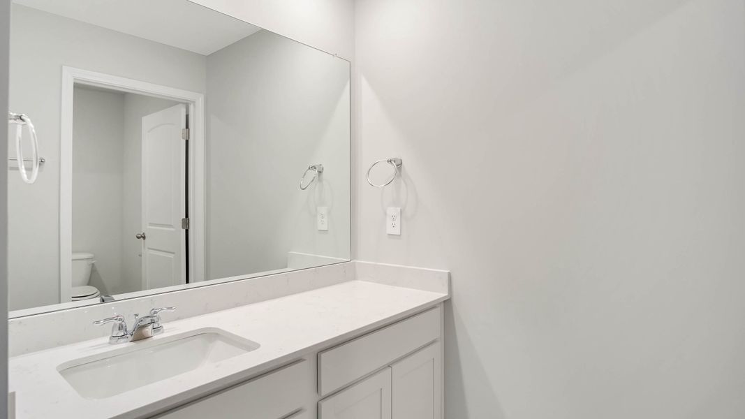 Furnished interior view inside a new home in The Parks, White House (Image 6).