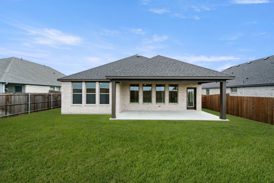 Exterior details and patio area of a home in Vista Point, Grandview (Image 4). Exterior details and patio area of a home in Vista Point, Grandview (Image 4).