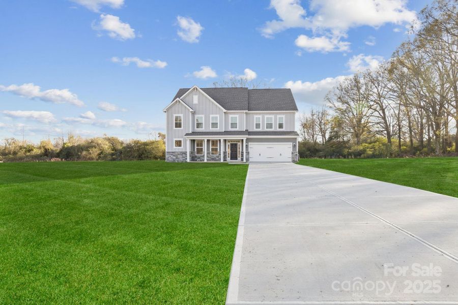Front exterior of a new home in Stonemill, Monroe, NC, highlighting curb appeal (Image 6).