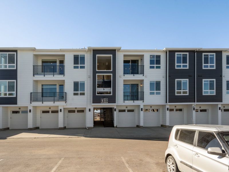 Front exterior of a new home in Gateway Commons, Denver, CO, highlighting curb appeal (Image 1).