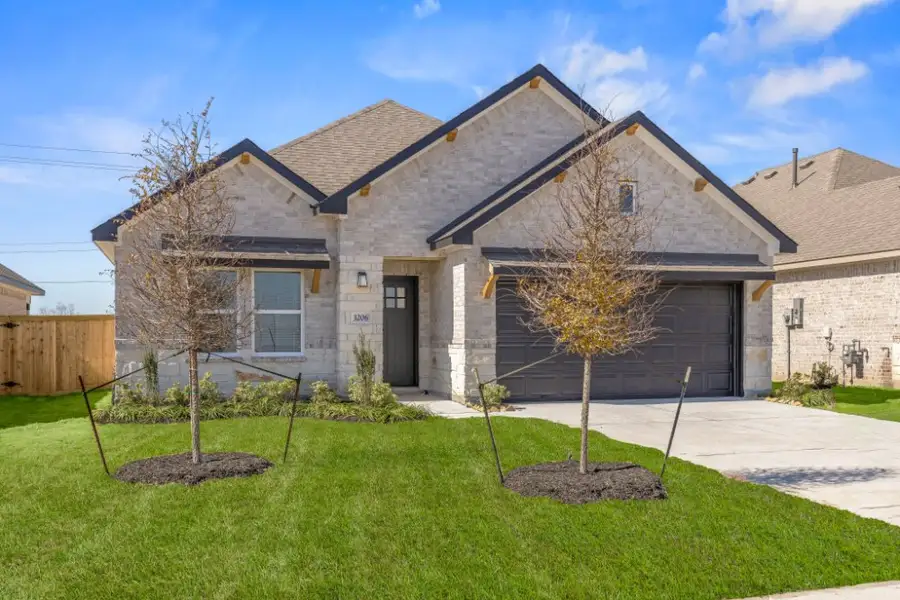 Front exterior of a new home in Ashland, Houston, TX, highlighting curb appeal (Image 17).