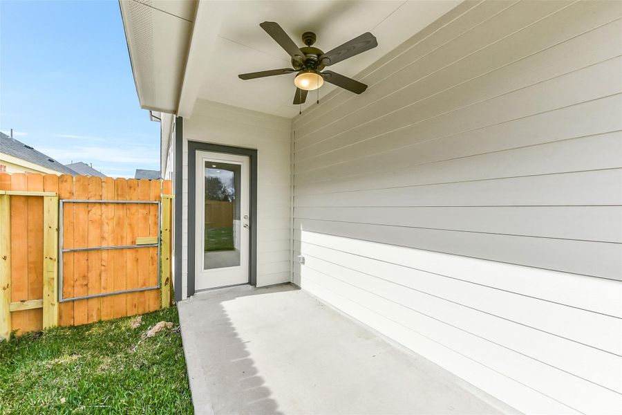 Exterior details and patio area of a home in , Houston (Image 1). Exterior details and patio area of a home in , Houston (Image 1).