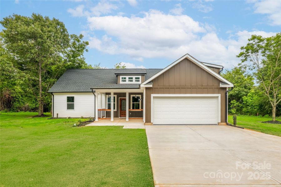 Front exterior of a new home in , Shelby, NC, highlighting curb appeal (Image 1).