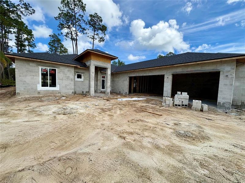 Front exterior of a new home in , Palm Coast, FL, highlighting curb appeal (Image 16).