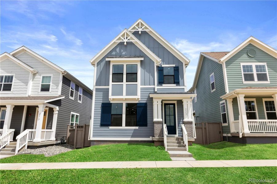 Front exterior of a new home in Westerly, Erie, CO, highlighting curb appeal (Image 14). Front exterior of a new home in Westerly, Erie, CO, highlighting curb appeal (Image 14).