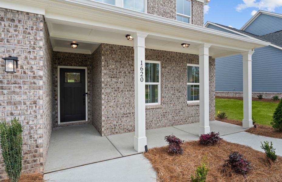 Exterior details and patio area of a home in Berkeley Mill, Cumming (Image 27).