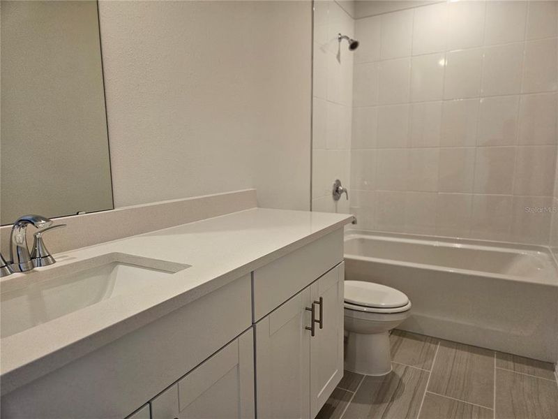 Furnished interior view inside a new home in Lawson Dunes - Signature Series, Haines City (Image 11).