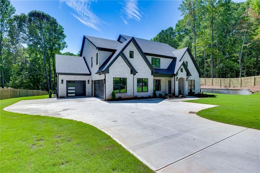 Front exterior of a new home in , Gainesville, GA, highlighting curb appeal (Image 7).