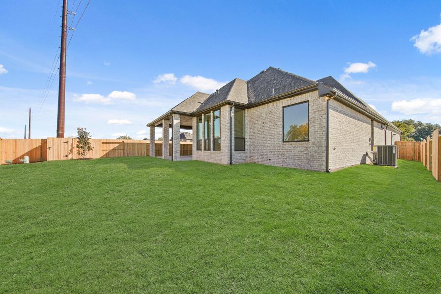Exterior details and patio area of a home in Sienna, Missouri City (Image 3). Exterior details and patio area of a home in Sienna, Missouri City (Image 3).