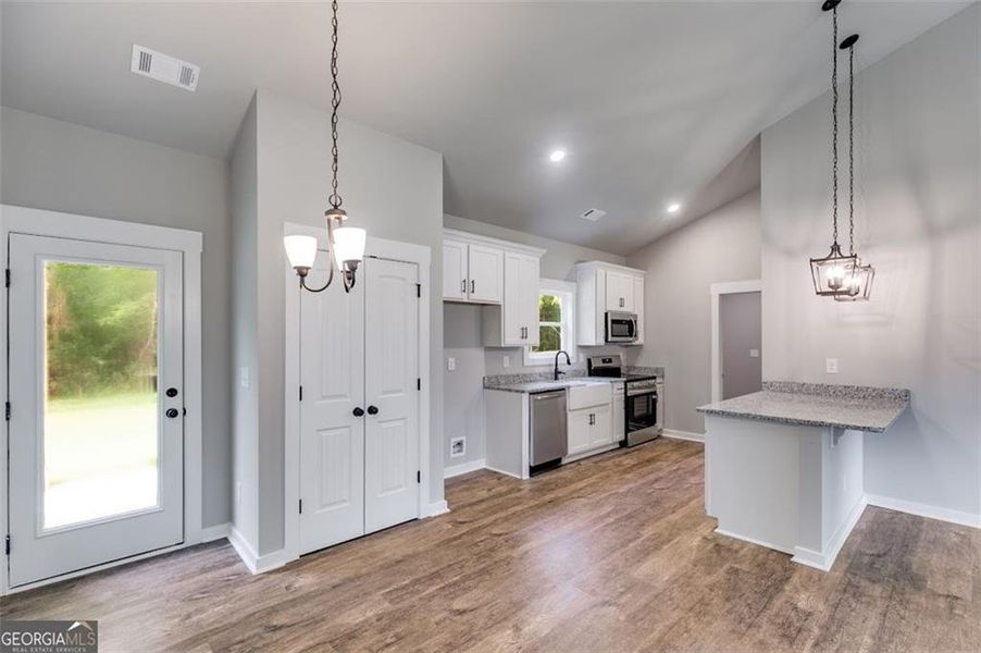 Furnished interior view inside a new home in , Buchanan (Image 11).