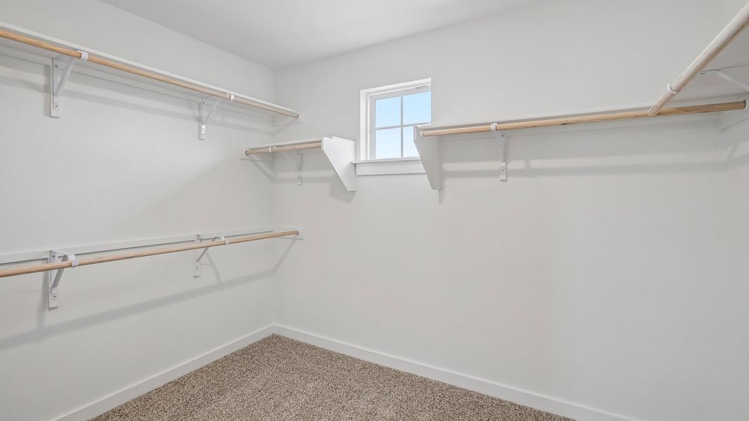 Spacious, unfurnished interior of a new home in Rosenbusch Ranch, Leander (Image 47).