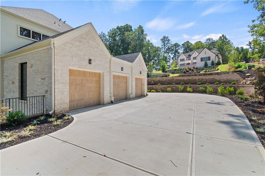 Front exterior of a new home in , Alpharetta, GA, highlighting curb appeal (Image 25).