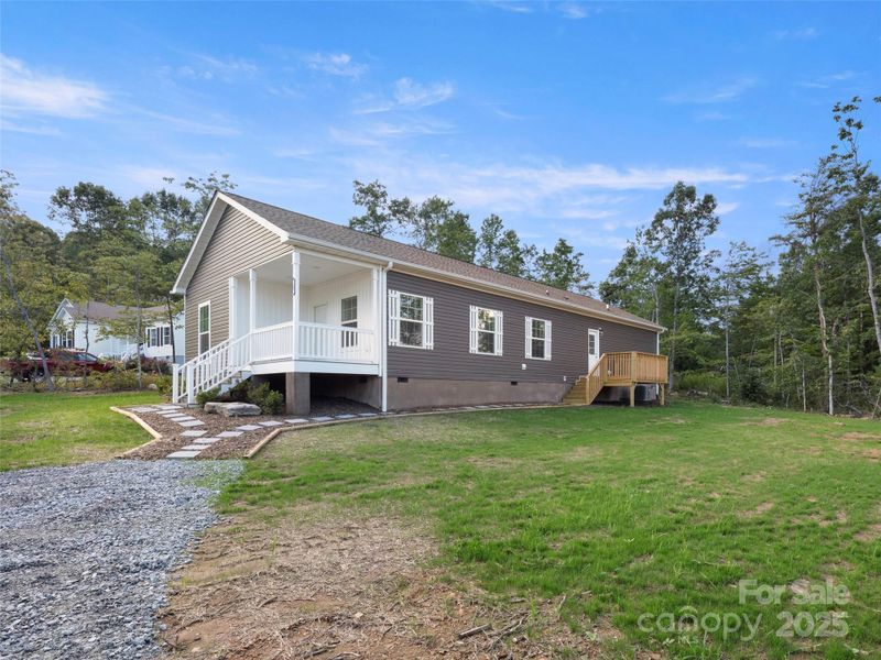 Front exterior of a new home in , Hendersonville, NC, highlighting curb appeal (Image 21).