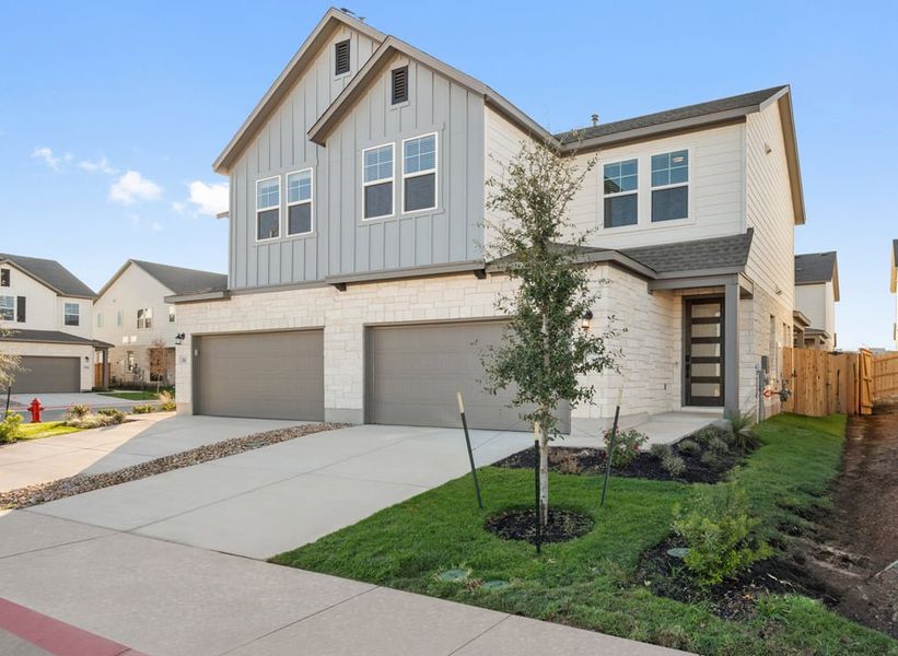 Front exterior of a new home in Union Collection at Park Central, Georgetown, TX, highlighting curb appeal (Image 2). Front exterior of a new home in Union Collection at Park Central, Georgetown, TX, highlighting curb appeal (Image 2).