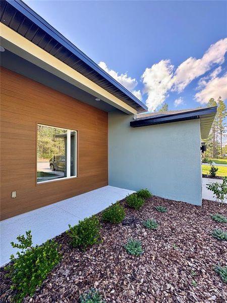 Front exterior of a new home in Marion Oaks, Ocala, FL, highlighting curb appeal (Image 18).