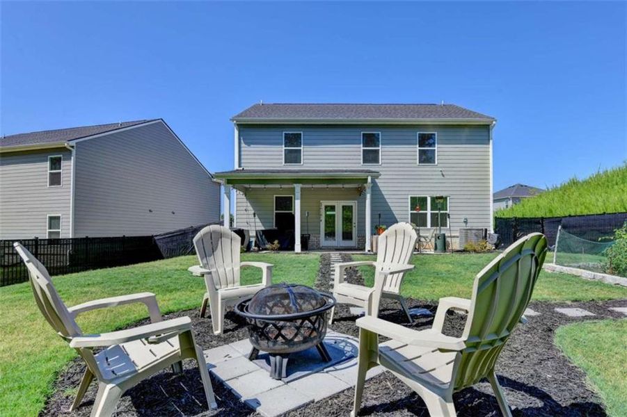 Exterior details and patio area of a home in Twin Lakes, Hoschton (Image 25).