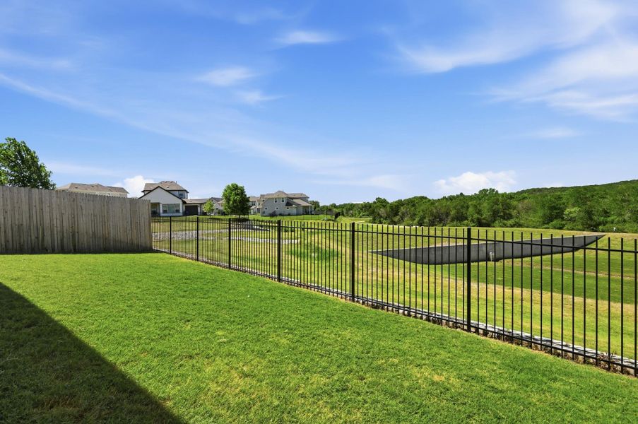 Exterior details and patio area of a home in Loyola, Austin (Image 24).