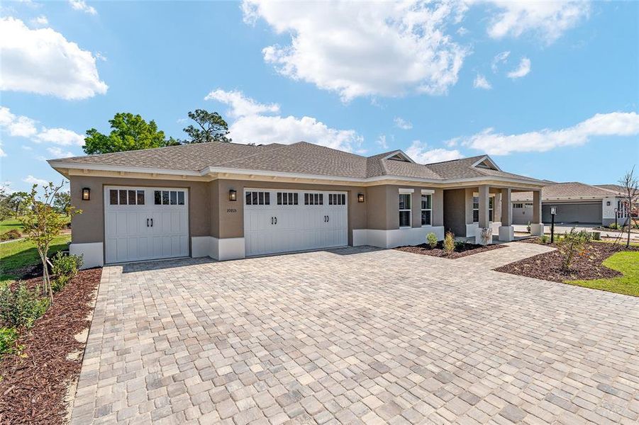 Front exterior of a new home in , Ocala, FL, highlighting curb appeal (Image 27).