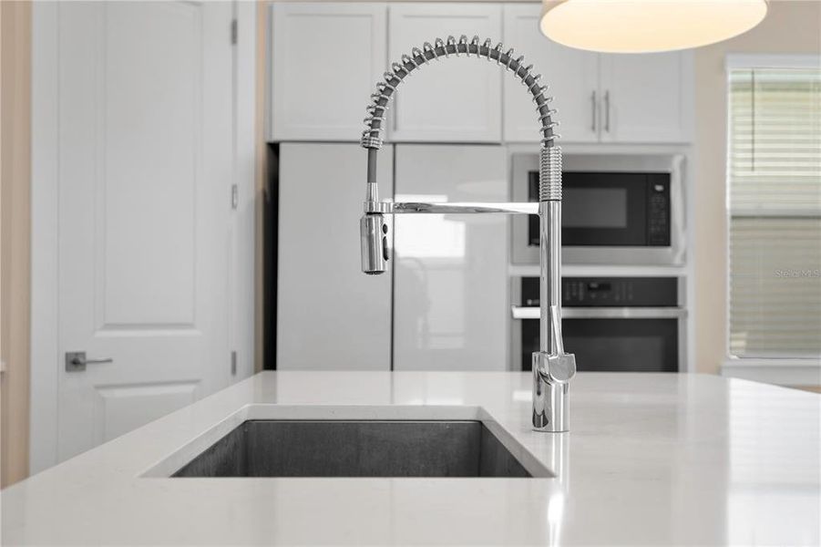 Furnished interior view inside a new home in , Winter Garden (Image 5).