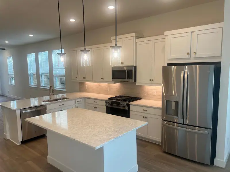 Furnished interior view inside a new home in Wood Leaf Reserve, Tomball (Image 5).